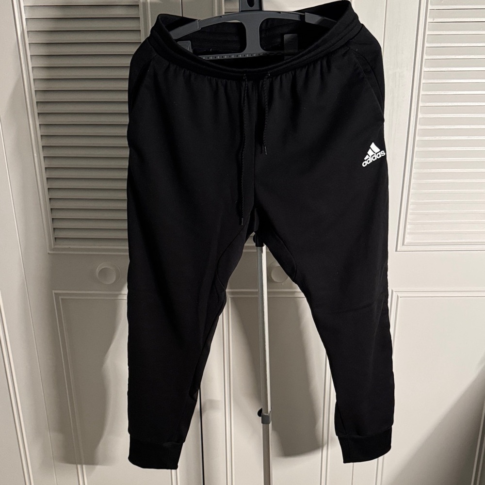 Adidas Black Basketball Joggers
Size XL